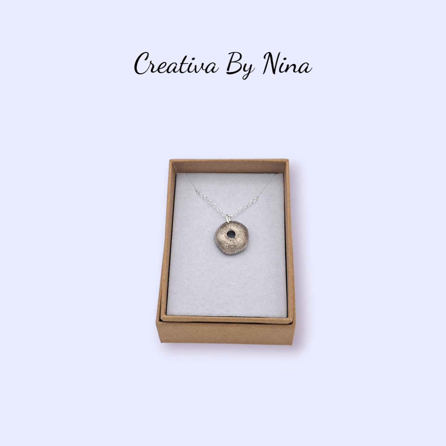 Fine silver sea urchin necklace