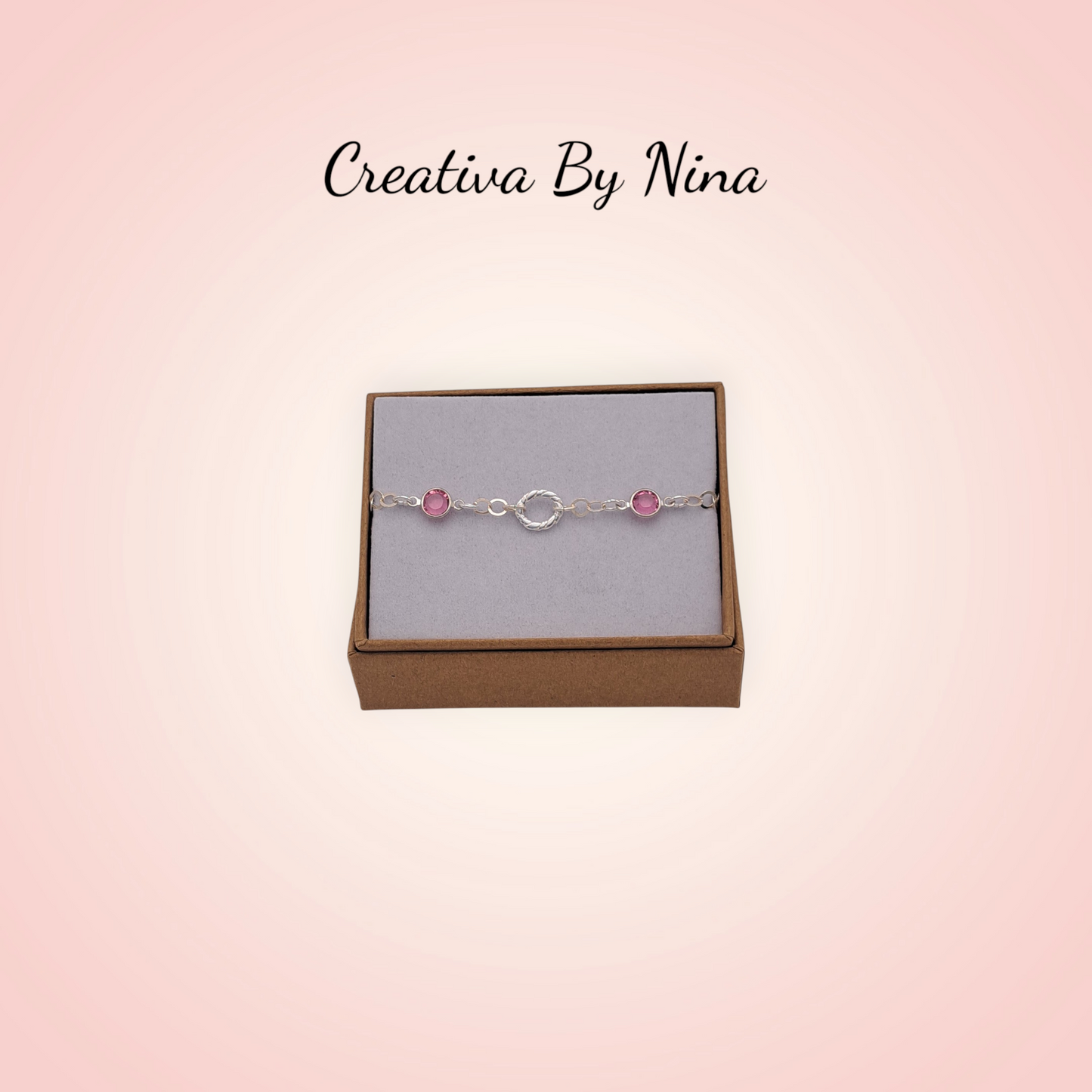 Preciosa bracelet with twisted oval focal link