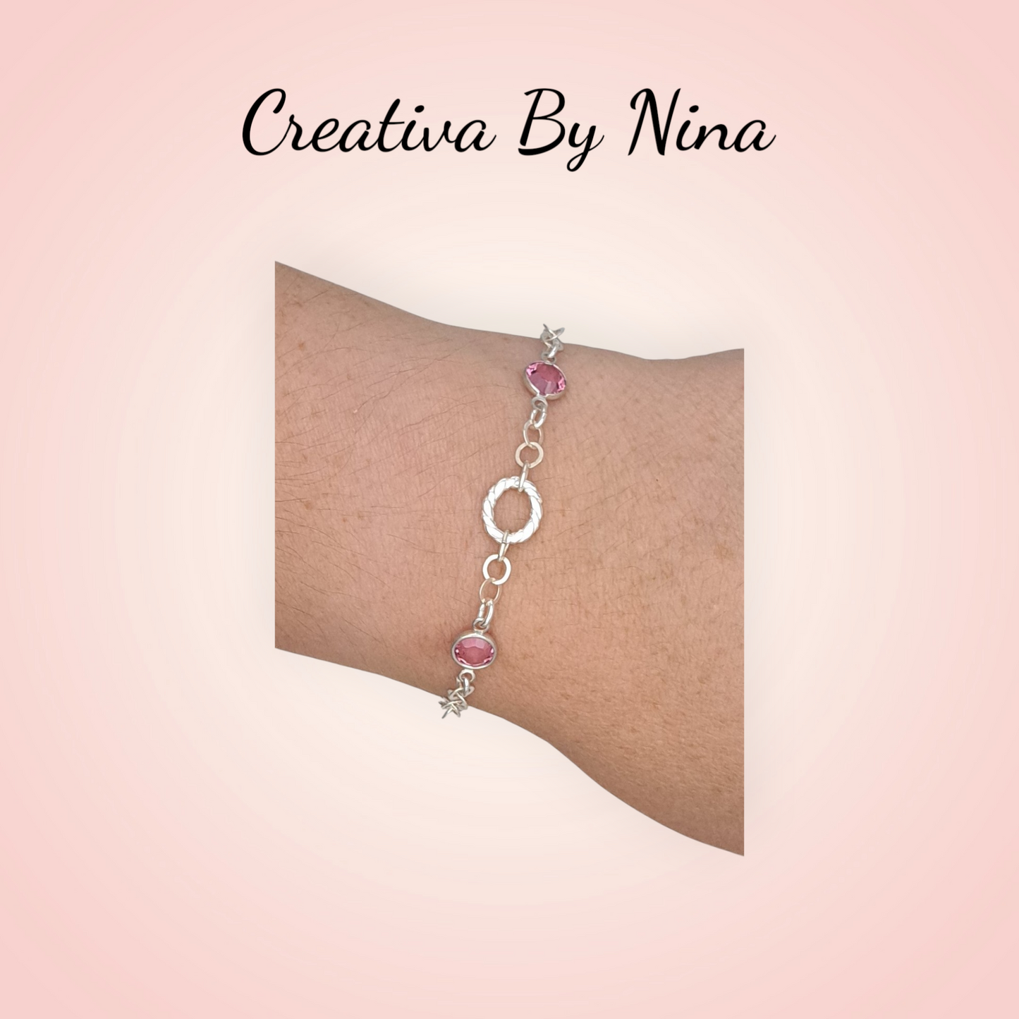 Preciosa bracelet with twisted oval focal link