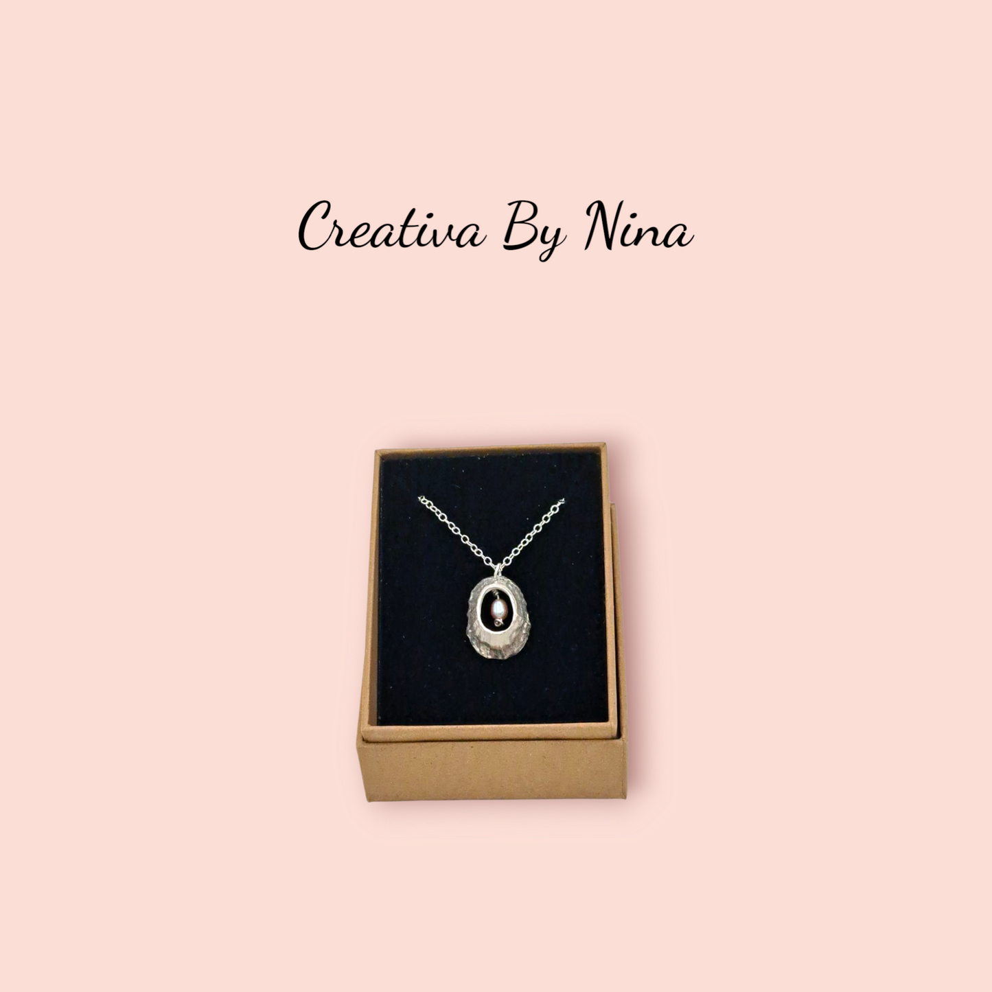 Fine silver limpet shell necklace with pink pearl