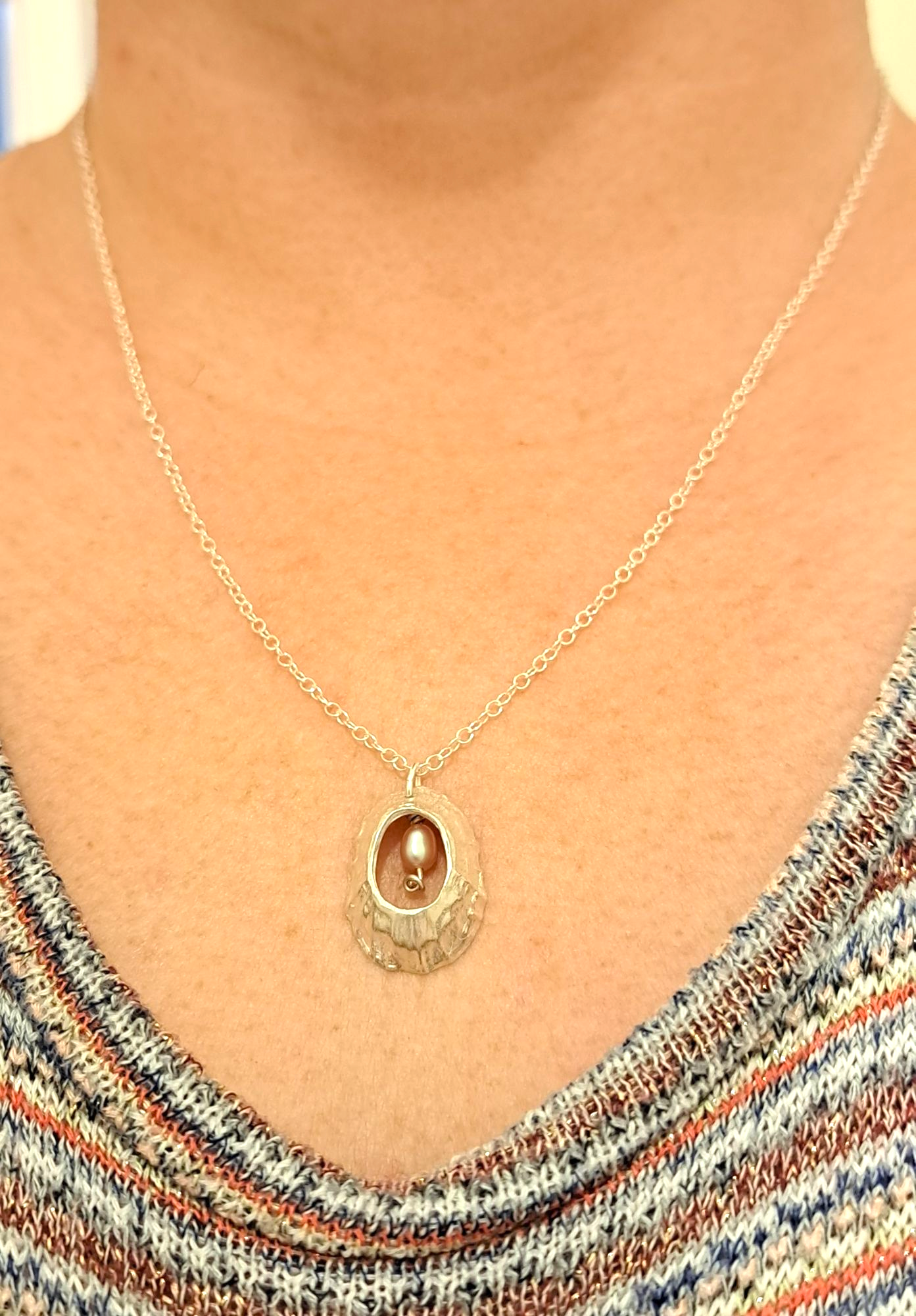Fine silver limpet shell necklace with pink pearl