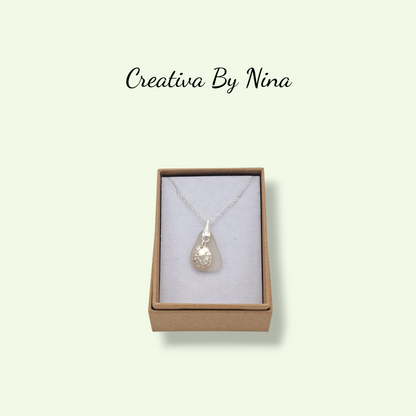 White frosted natural sea glass with fine silver limpet charm