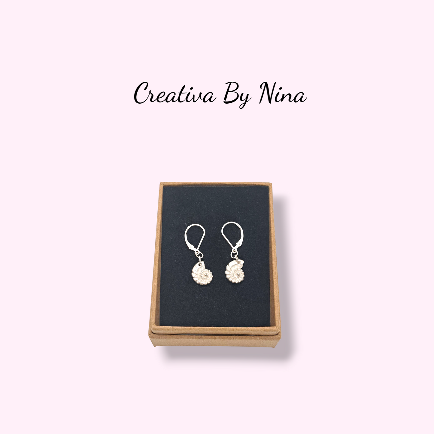 Fine silver ammonite shell style earrings