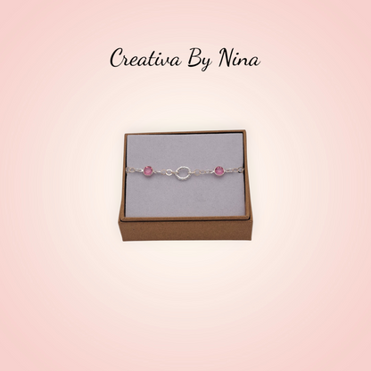Preciosa bracelet with twisted oval focal link