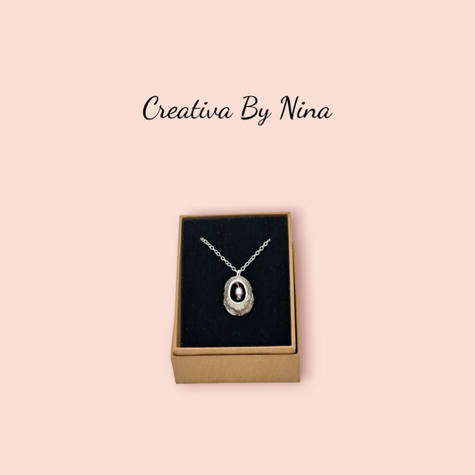 Fine silver limpet shell necklace with pink pearl